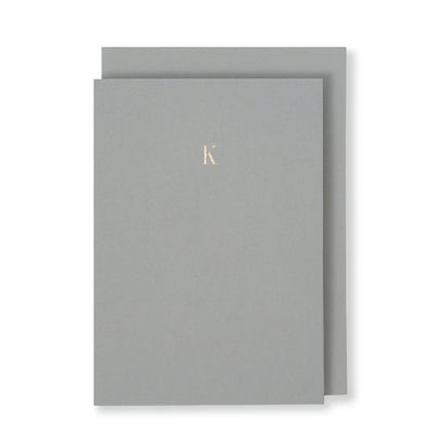 K Greeting Card in Grey, Front | Story of Elegance