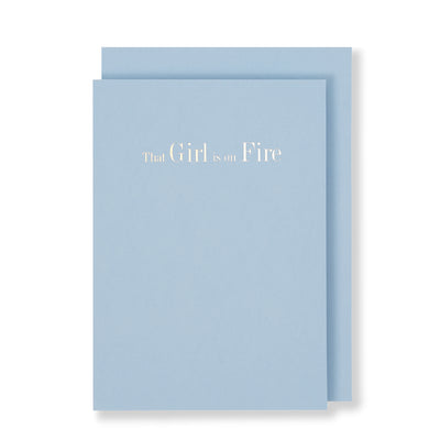 That Girl Is On Fire Greeting Card in Pastel Blue, Front