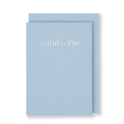 That Girl Is On Fire Greeting Card in Pastel Blue, Front