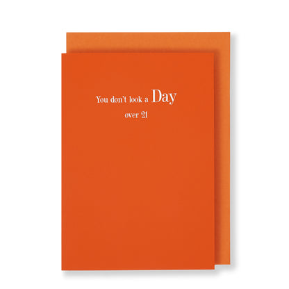 You Dont Look A Day Over 21 Greeting Card in Orange, Front