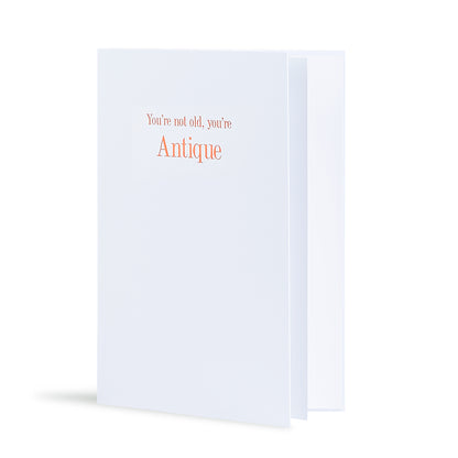 You're Not Old Youre Antique Greeting Card in White, Side